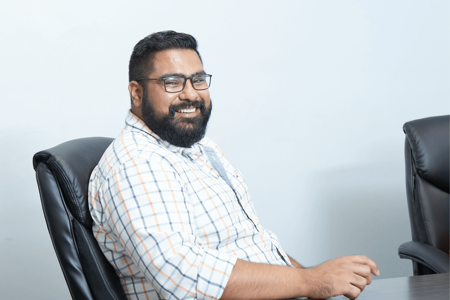 Man sitting in front of a computer