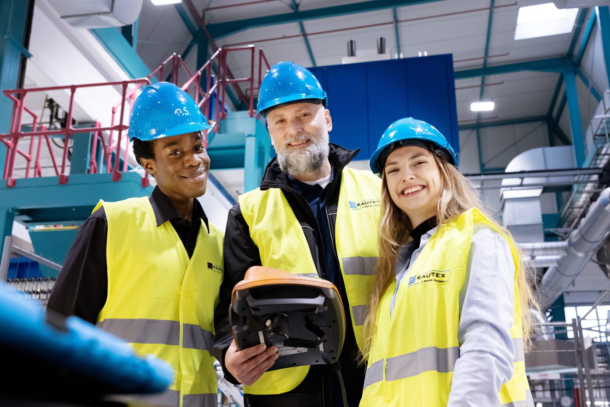 Engineers smiling at camera