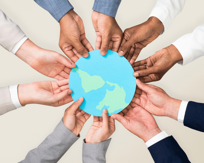 hands holding a globe